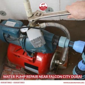 Technician diagnosing water pump issue Falcon City Dubai