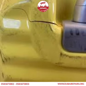 Luggage wheel and handle replacement in progress at Dubai Repairs workshop