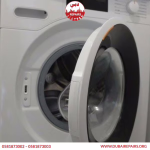 Technician inspecting Whirlpool washing machine suspension rods during F0 E5 repair