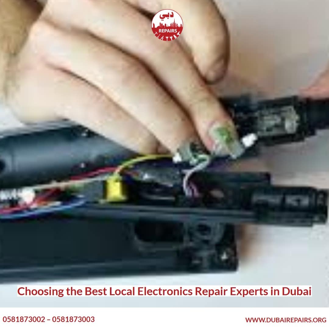 Technician diagnosing an electronic device fault in a Dubai repair centre