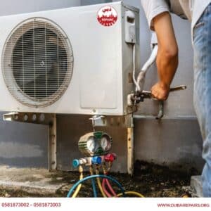 HVAC Technician Repairing AC Unit Dubai